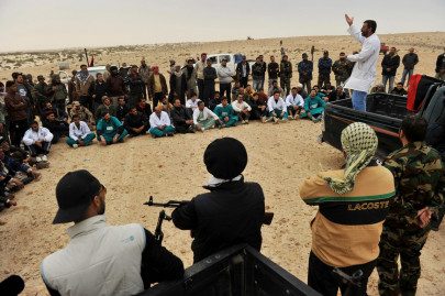 libyan rebels win battle in west push on from east