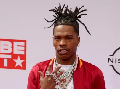 lil baby s red cybertruck co signed by elon musk draws mixed reactions from fans lil baby s red cybertruck co signed by elon musk draws mixed reactions from fans