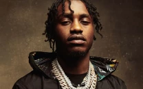 rapper lil tjay sued by nypd officer over alleged msg brawl