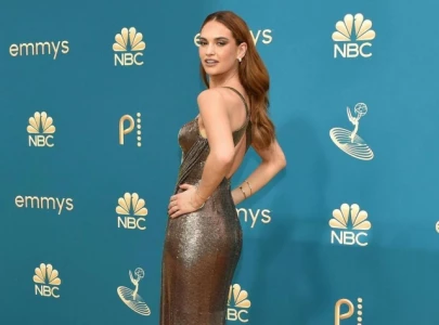 lily james shares cryptic message in vacation photos amid brian chesky rumors