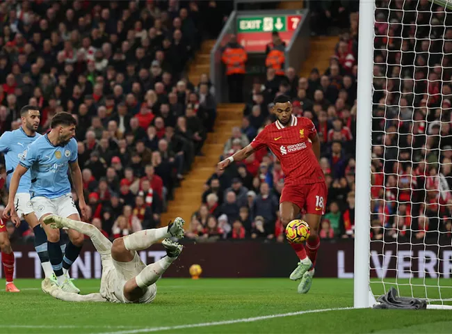 liverpool defeat struggling man city 2 0 to take nine point lead liverpool defeat struggling man city 2 0 to take nine point lead