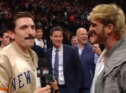 logan paul in scuffle with comedian andrew schulz on wwe raw logan paul in scuffle with comedian andrew schulz on wwe raw