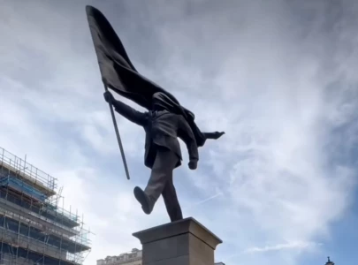 banksy confirms behind new london statue of man blinded by flag