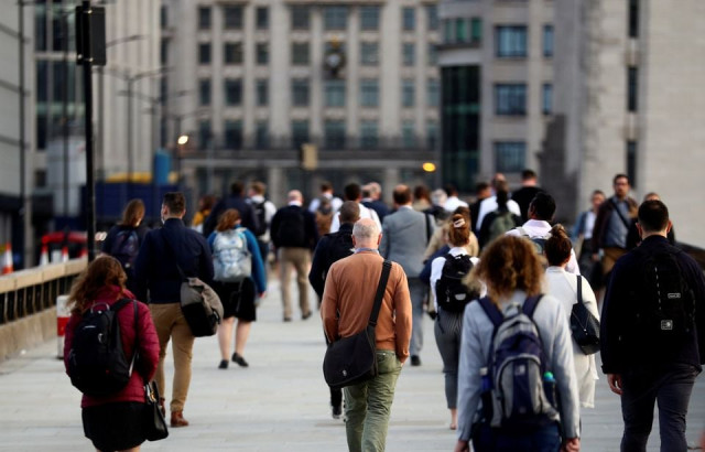 commuters walk across the london bridge during the morning rush hour amid an outbreak of the coronavirus disease covid 19 in london britain september 17 2020 reuters hannah mckay commuters walk across the london bridge during the morning rush hour amid an outbreak of the coronavirus disease covid 19 in london britain september 17 2020 reuters hannah mckay