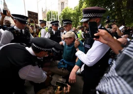 uk police arrest 200 at protest supporting banned palestine action group