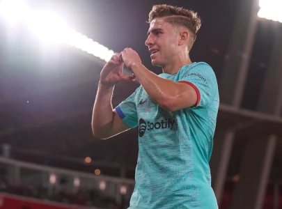 lopez double earns barca win at relegated almeria lopez double earns barca win at relegated almeria