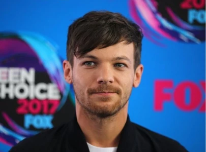 louis tomlinson opens up on liam payne death and emotional impact on new album