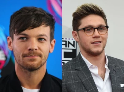 niall horan spotted at louis tomlinson paris show amid feud with zayn malik fans ask is he taking sides