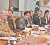 high ranking civil and military officials attend a meeting on the k p law and order situation in peshawar photo express