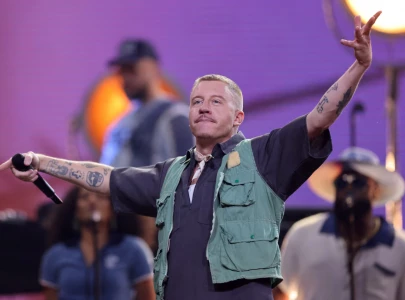 macklemore vows to fight until last breath at opening of free palestine tour
