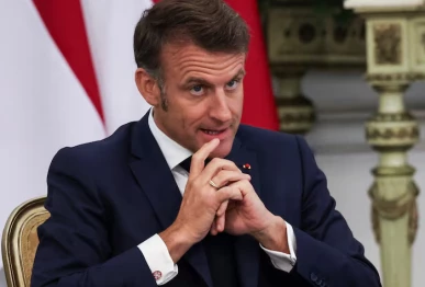 french president emmanuel macron gestures during an agreement signing at the merdeka palace in jakarta indonesia may 28 2025 photo reuters