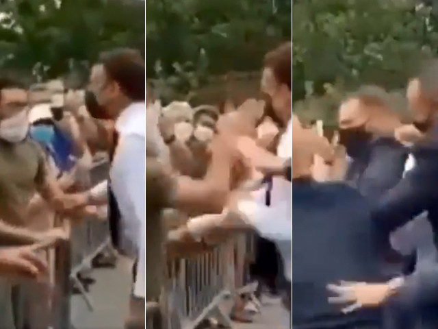 in video circulating on social media macron dressed in shirt sleeves could be seen walking towards a crowd of well wishers who were behind a metal barrier screen shots