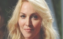 madonna springs a surprise at dolce gabbana show in milan