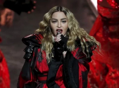 madonna returns to warner records with dance sequel album set for july release