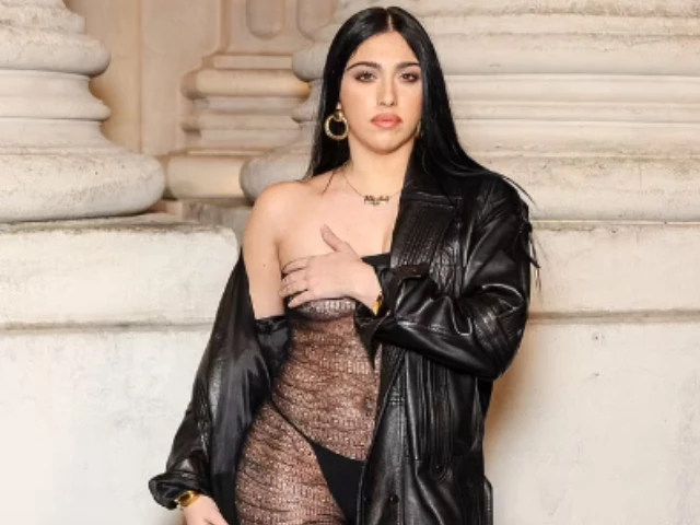 madonna s daughter lourdes leon wears revealing catsuit at saint laurent s paris fashion week show madonna s daughter lourdes leon wears revealing catsuit at saint laurent s paris fashion week show
