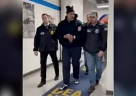 a still image shows venezuela s president nicolas maduro being walked in custody down a hallway at the offices of the us drug enforcement administration dea in new york city us january 3 2026 photo reuters