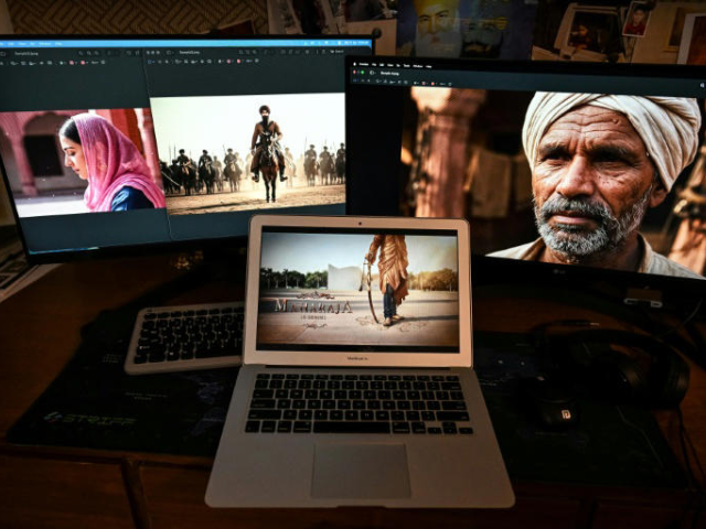 Visuals from Maharaja in Denims, a book adaptation being developed as one of the world's first full-length AI-generated realism films, displayed on computers © Tauseef MUSTAFA