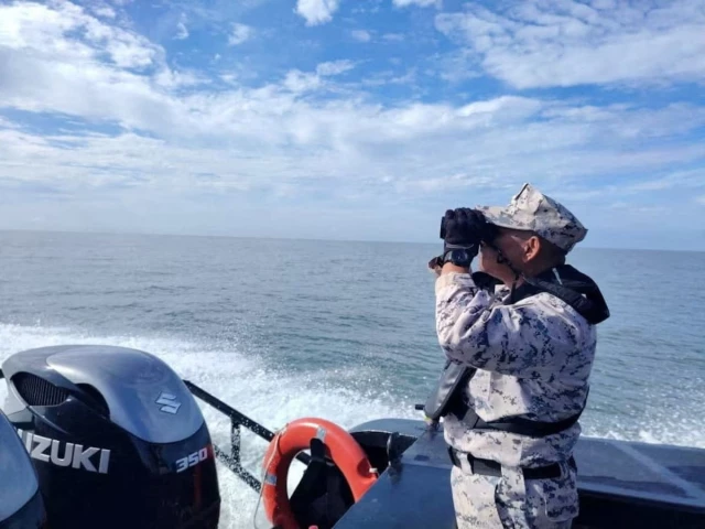 a staff member of the malaysian maritime enforcement agency searches for victims of a boat from buthidaung myanmar that sank near the malaysia thailand border during a search and rescue operation close to langkawi malaysia november 9 2025 photo reuters a staff member of the malaysian maritime enforcement agency searches for victims of a boat from buthidaung myanmar that sank near the malaysia thailand border during a search and rescue operation close to langkawi malaysia november 9 2025 photo reuters