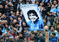 april 12 2026 napoli fans in the stands hold up a sign of diego maradona in the stands before the match photo reuters