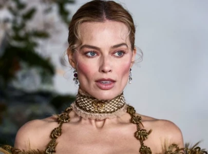 margot robbie teases glamorous monaco grand prix setting for ocean s 11 prequel story