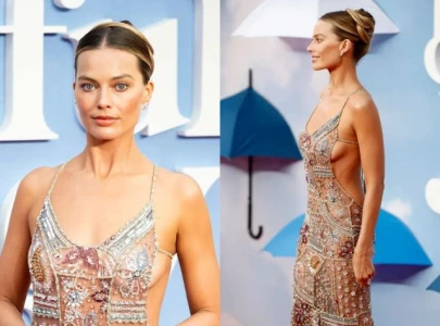 margot robbie stuns in sheer armani tribute gown in first red carpet since pregnancy margot robbie stuns in sheer armani tribute gown in first red carpet since pregnancy