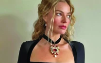 bradley and margot unite for high stakes ocean s origin bradley and margot unite for high stakes ocean s origin