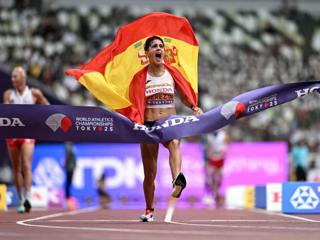 spain s maria perez celebrates as she crosses the finish line to win the women s 35km race walk final during the world athletics championships in tokyo on september 13 2025 photo afp