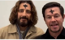mark wahlberg and jonathan roumie share ash wednesday moment with matching crosses during lent