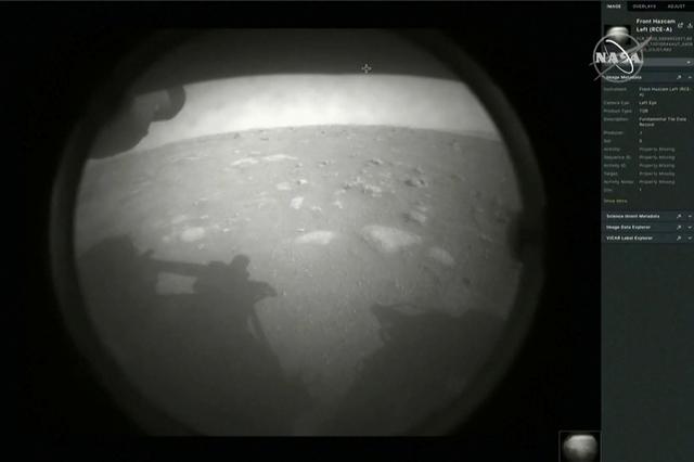 the first images arrive moments after nasa s perseverance mars roverspacecraft successfully touched down on mars at nasa s jet propulsion laboratory in pasadena photo nasa tv reuters