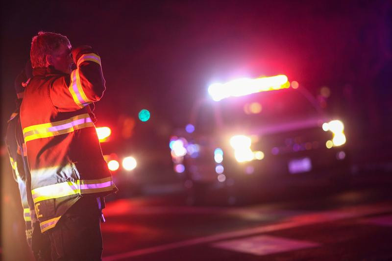 first responders stand in salute as a procession of law enforcement vehicles drive past in honour of fallen boulder police officer eric talley who was shot and killed by a gunman at a king soopers grocery store in boulder colorado us march 22 2021 photo reuters