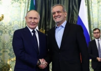russian president vladimir putin and iranian president masoud pezeshkian shake hands as they meet in moscow russia january 17 2025 photo reuters