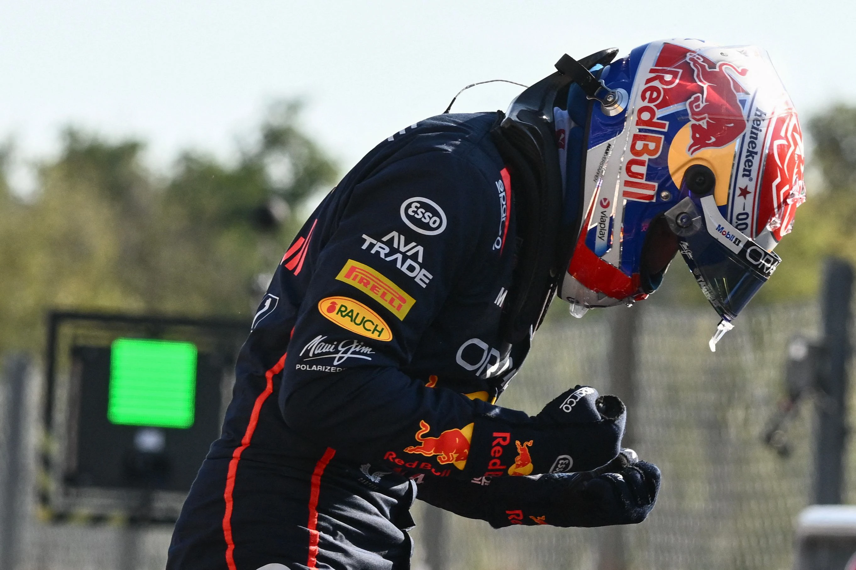 red bull racing s dutch driver max verstappen celebrates his pole position after the qualifying session ahead of the italian formula one grand prix photo afp