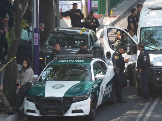 police inspect the car where mexico city mayor clara brugada s private secretary and an adviser were killed in mexico city on tuesday photo ap police inspect the car where mexico city mayor clara brugada s private secretary and an adviser were killed in mexico city on tuesday photo ap