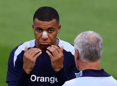 mbapp trains with tricolore mask post nose injury at euro 2024