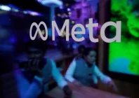 people are seen behind a logo of meta platforms during a conference in mumbai india september 20 2023 reuters