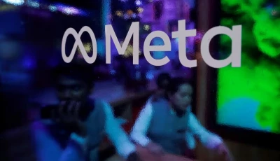 people are seen behind a logo of meta platforms during a conference in mumbai india september 20 2023 reuters