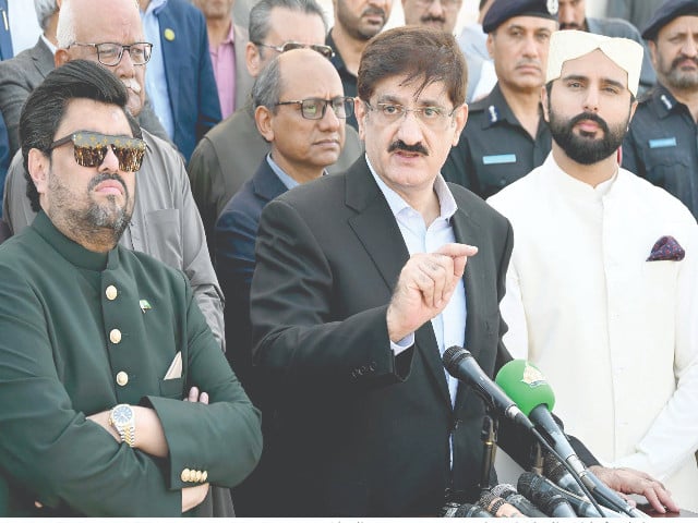 governor kamran tessori and cm murad ali shah talk to the media at quaid s mazar photo express