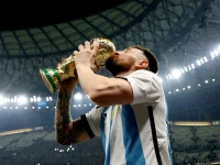 december 18 2022 argentina s lionel messi kisses the trophy as he celebrates winning the world cup photo reuters