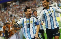 argentina s lionel messi celebrates scoring their second goal with leandro paredes photo reuters