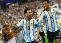 argentina s lionel messi celebrates scoring their second goal with leandro paredes photo reuters