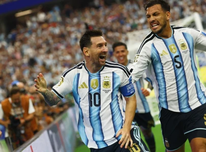 messi breaks world cup scoring record as argentina seal knockout berth messi breaks world cup scoring record as argentina seal knockout berth
