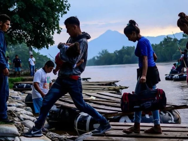 central american migrants arrive in ciudad hidalgo mexico on june 10 after crossing the suchiate river from guatemala on a makeshift raft photo afp central american migrants arrive in ciudad hidalgo mexico on june 10 after crossing the suchiate river from guatemala on a makeshift raft photo afp