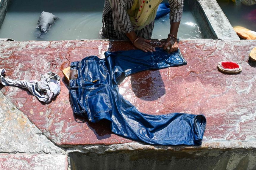 accused lalan kumar 20 will have to buy detergent and other items needed to provide six months of free laundry services to about 2 000 women in the village of majhor in bihar state photo afp file