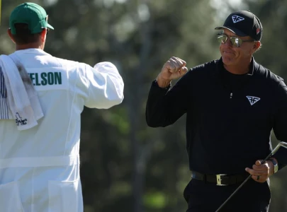 mickelson defies expectations with masters 65 mickelson defies expectations with masters 65