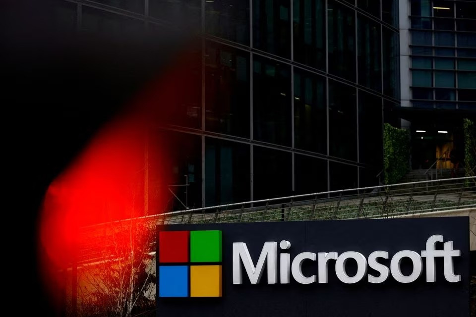 Microsoft results top forecasts, shares jump 8%