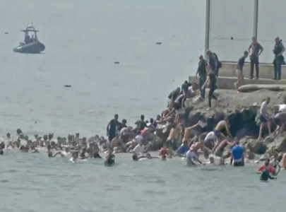 spain deploys troops as migrants storm ceuta