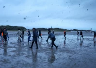 migrants react as are they dispersed by police while they try to leave the coast of northern france in an attempt to cross the english channel to reach britain from the beach of petit fort philippe in gravelines near calais france september 28 2026 reuters