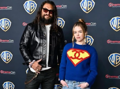 milly alcock and jason momoa tease messed up scenes in supergirl
