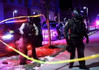 law enforcement officers stand guard around a hotel where greg bovino who has been removed from his role as the commander at large for the us border patrol is reportedly staying in maple grove minnesota us january 26 2026 photo reuters