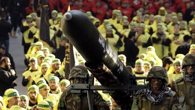 hezbollah fighters with locally made missile photo afp